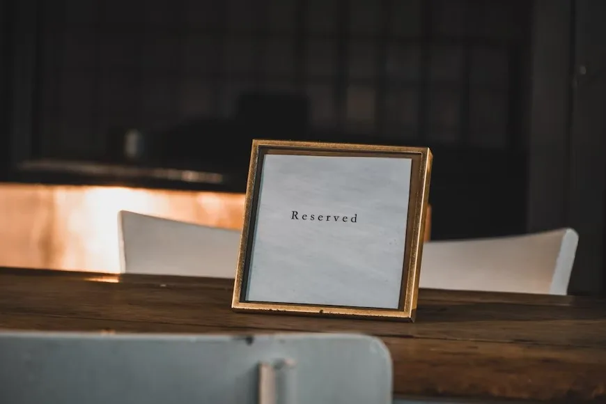 pub table booking system shown on laptop